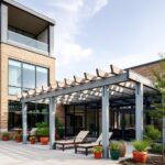 Modern office building with a wood and metal pergola